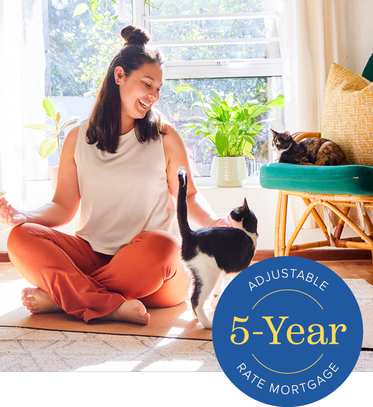 Person sitting on floor with a cat and button in corner that says, "Adjustable 5-year rate mortgage